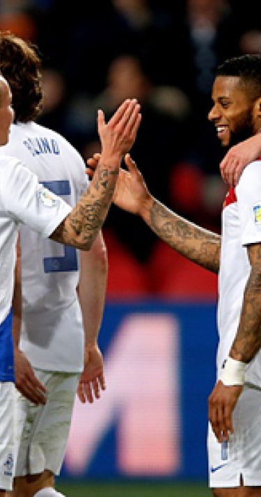 Oranje al met &eacute;&eacute;n been in Brazili&euml;